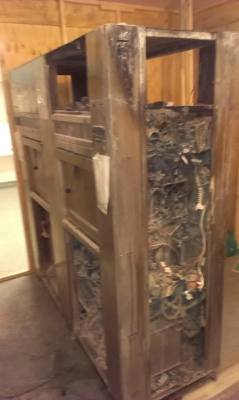 Fire-gutted machine housing